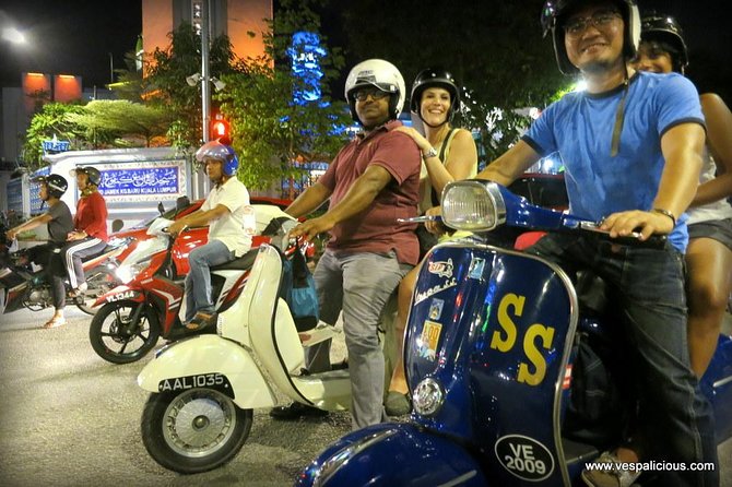 Cooler Lumpur by Night - Safety and Comfort: What Helmets and Ponchos Change