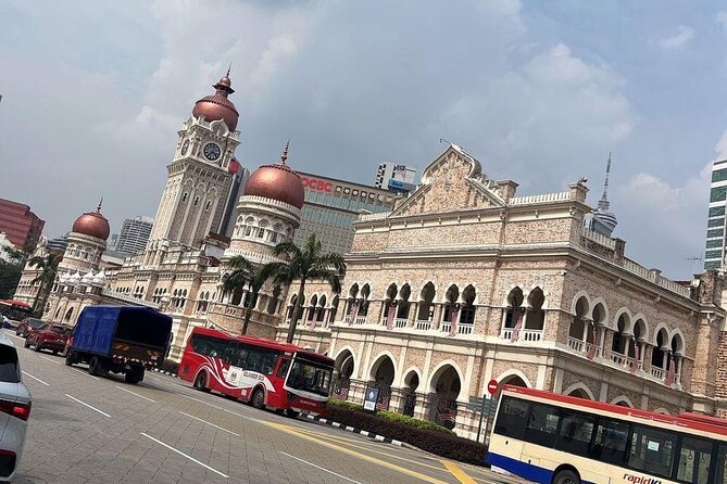 Exclusive Half Day Batu Caves and Private City Tour Kuala Lumpur - Inside Batu Caves: the guide helps you read the temples, not just see them