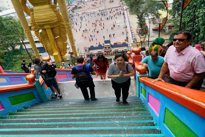 Kuala Lumpur Half Day Batu Caves And Cultural Group Tour - What the guide does for you, from Aru to Sither, and the driving mix