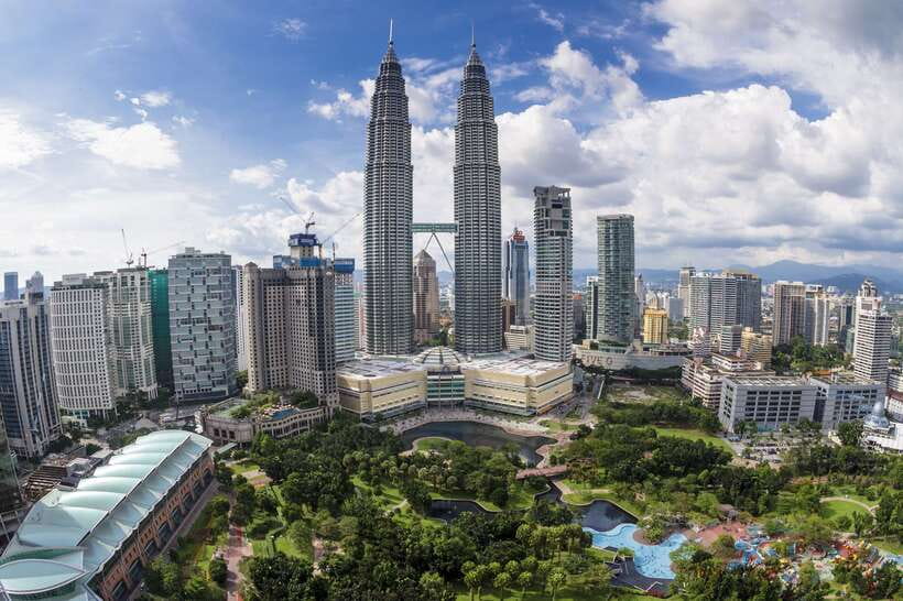 Kuala Lumpur: Half-Day Photo Tour with Petronas Twin Towers - Petronas Twin Towers: observation deck time and the 2-story bridge