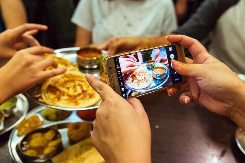 Kuala Lumpur: Private Food Tour – 10 Tastings with Locals - Guan Di Temple and Sri Mahamariamman Temple, eating with context