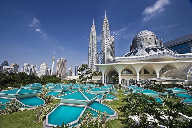 Private FullDay Tour includes Petronas Twin Towers & Batu Caves - Stop 1: Batu Caves, a 100-Year-Old Temple Complex With Limestone Power