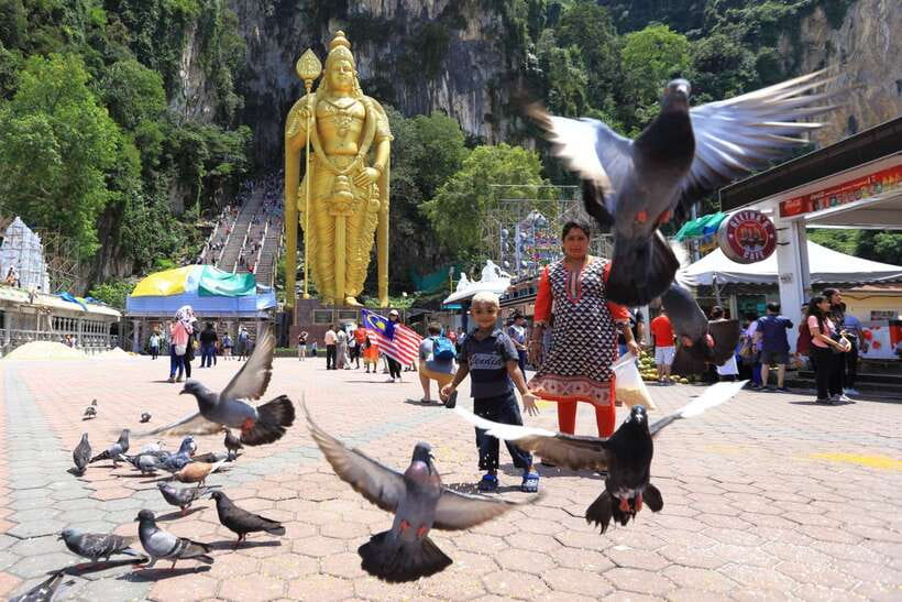 Private KL City Tour with Petronas Twin Towers & Batu Caves - National Monument: Independence at Street-Level Scale