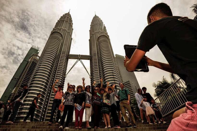 Private KL City Tour with Petronas Twin Towers & Batu Caves - Start With Batu Caves, Lord Muruga, and the Stair Reality Check