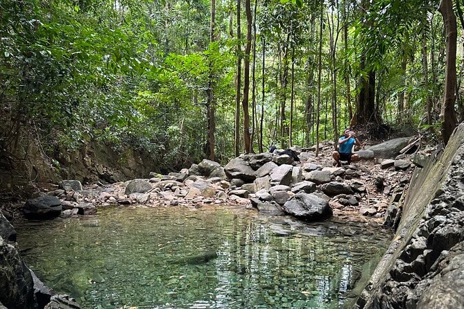 Telaga Tujuh Waterfall Half Day and Sacred Blue Pool Tour - Telaga Tujuh Waterfall pools, top area vs bottom photos