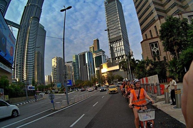 The Best of Kuala Lumpur Sunset and Night tour - Food on the ride: local dinner plus bottled water and fruit